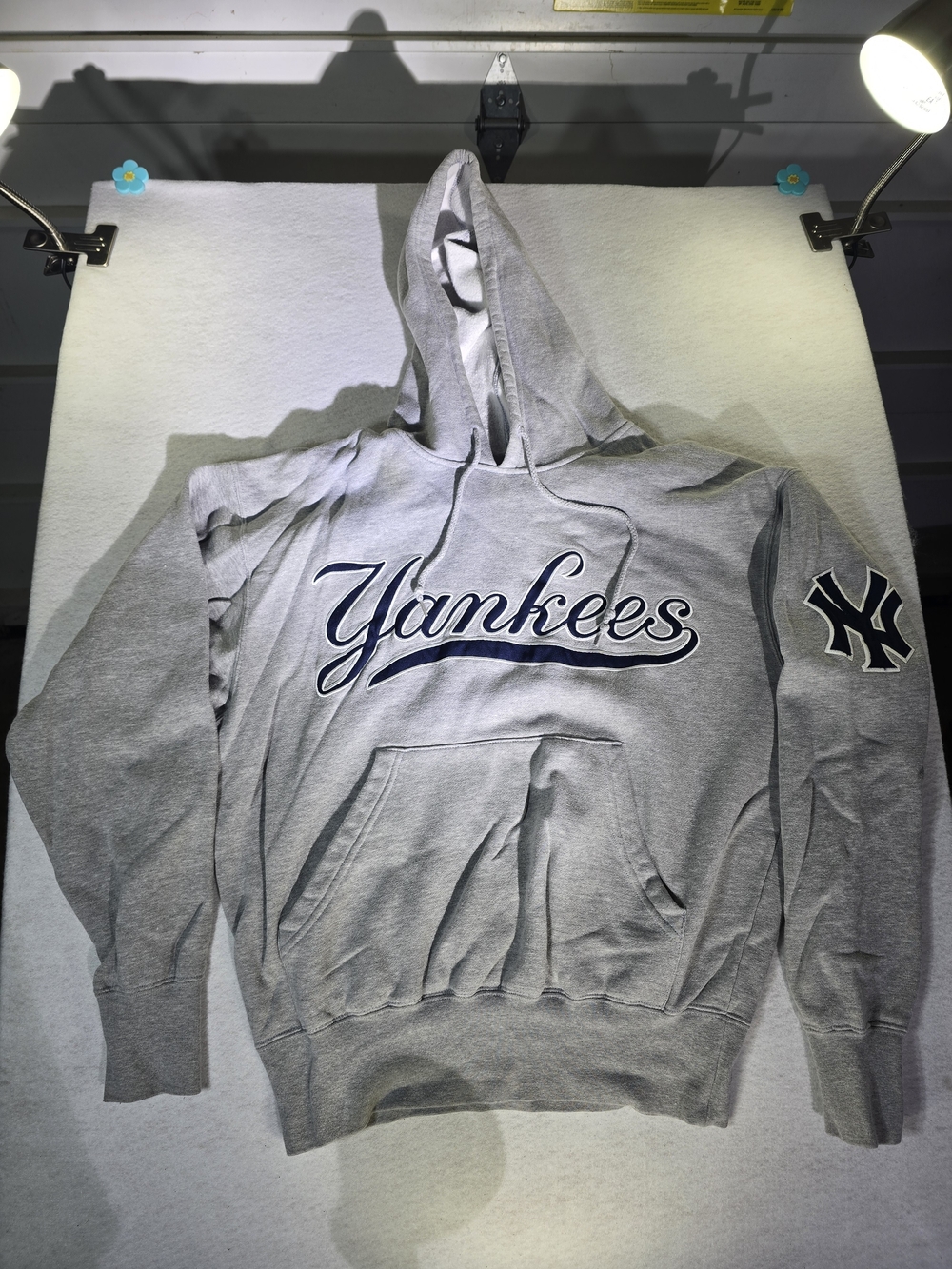 Gray Script Logo Hooded Sweatshirt. From Majestic. Embroidered Yankees And Logo